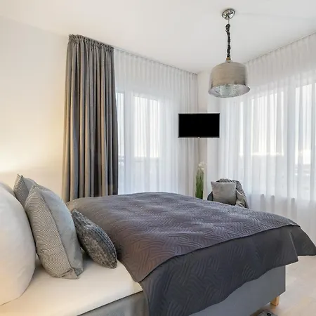 Semesterbostad Herzmuschel Erste Reihe, Dachterrasse, Schleiblick, Garten, Carport, Gaskamin, Sauna, Terrasse, Strandkorb, Aussenrolllaeden