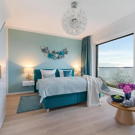 Semesterbostad Herzmuschel Erste Reihe, Dachterrasse, Schleiblick, Garten, Carport, Gaskamin, Sauna, Terrasse, Strandkorb, Aussenrolllaeden Olpenitz