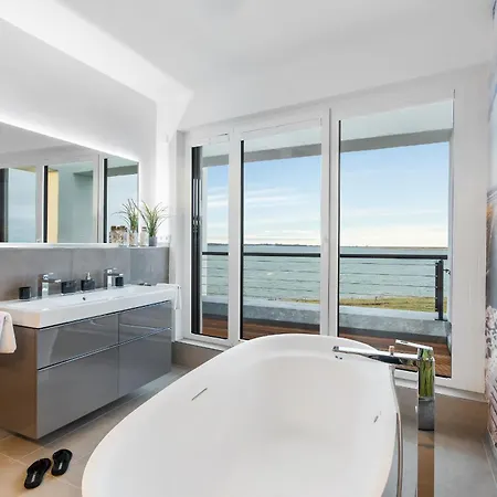 Herzmuschel Erste Reihe, Dachterrasse, Schleiblick, Garten, Carport, Gaskamin, Sauna, Terrasse, Strandkorb, Aussenrolllaeden * Olpenitz