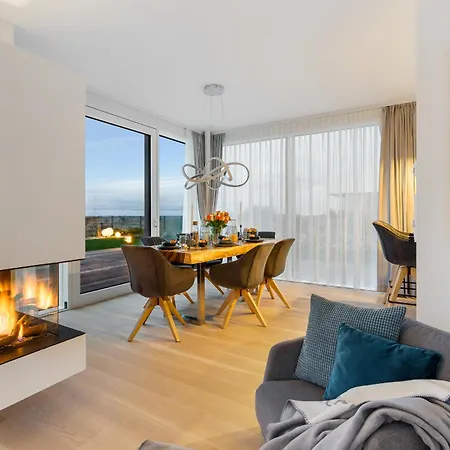 Semesterbostad Herzmuschel Erste Reihe, Dachterrasse, Schleiblick, Garten, Carport, Gaskamin, Sauna, Terrasse, Strandkorb, Aussenrolllaeden Olpenitz