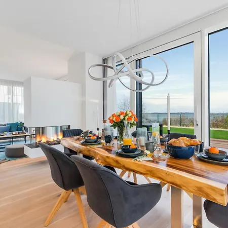 Semesterbostad Herzmuschel Erste Reihe, Dachterrasse, Schleiblick, Garten, Carport, Gaskamin, Sauna, Terrasse, Strandkorb, Aussenrolllaeden