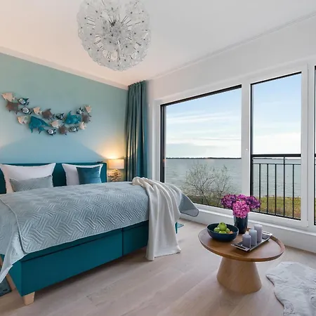 Herzmuschel Erste Reihe, Dachterrasse, Schleiblick, Garten, Carport, Gaskamin, Sauna, Terrasse, Strandkorb, Aussenrolllaeden Semesterbostad Olpenitz