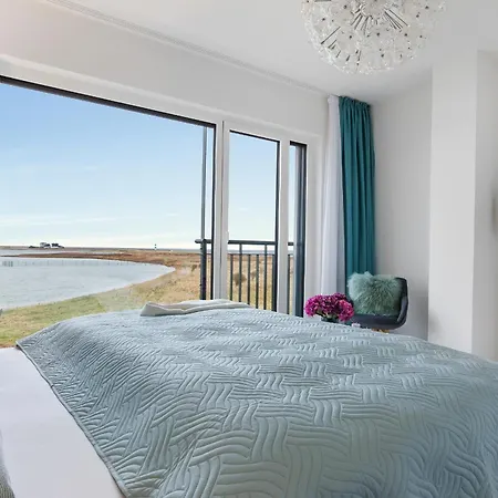 Herzmuschel Erste Reihe, Dachterrasse, Schleiblick, Garten, Carport, Gaskamin, Sauna, Terrasse, Strandkorb, Aussenrolllaeden Olpenitz