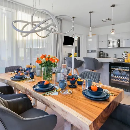 Herzmuschel Erste Reihe, Dachterrasse, Schleiblick, Garten, Carport, Gaskamin, Sauna, Terrasse, Strandkorb, Aussenrolllaeden Olpenitz