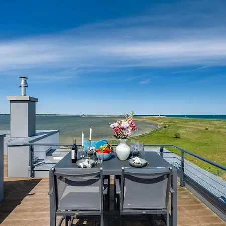 Herzmuschel Erste Reihe, Dachterrasse, Schleiblick, Garten, Carport, Gaskamin, Sauna, Terrasse, Strandkorb, Aussenrolllaeden Semesterbostad
